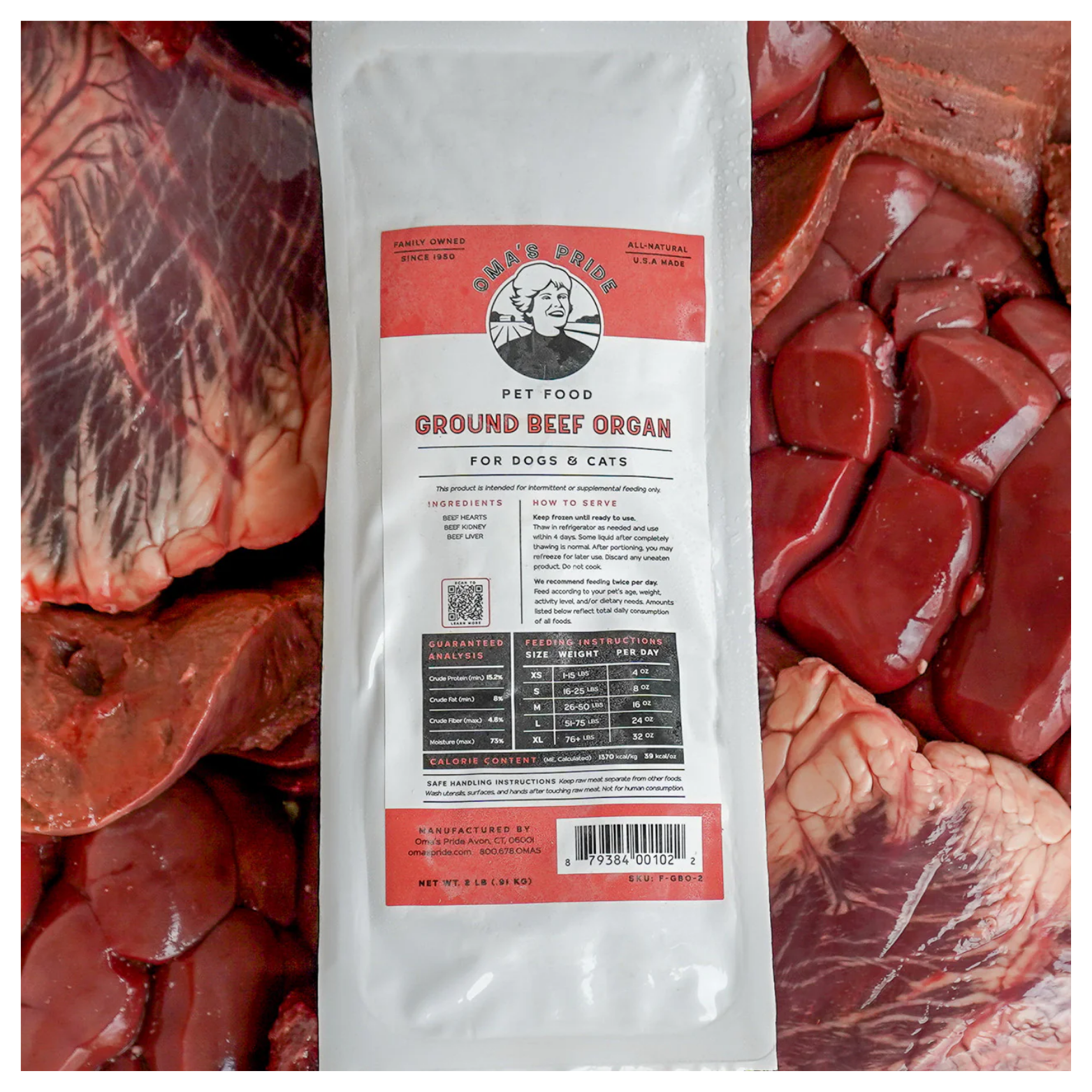 A sealed package of Oma’s Pride Ground Beef Organ raw frozen pet food displayed on top of raw beef organs.