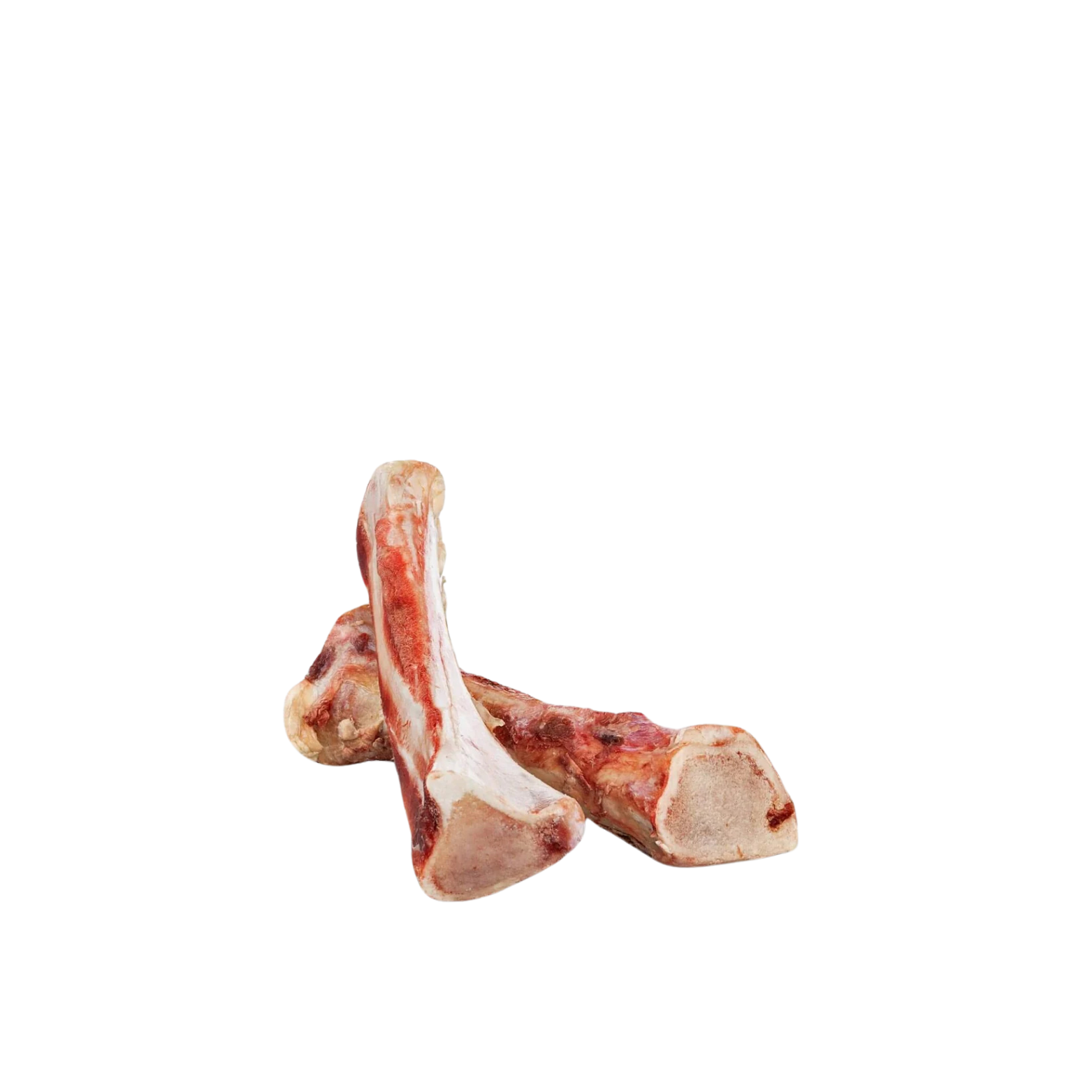 Two raw buffalo marrow bones stacked and leaning against each other, showing the cut ends and marrow interior, isolated on a black background.