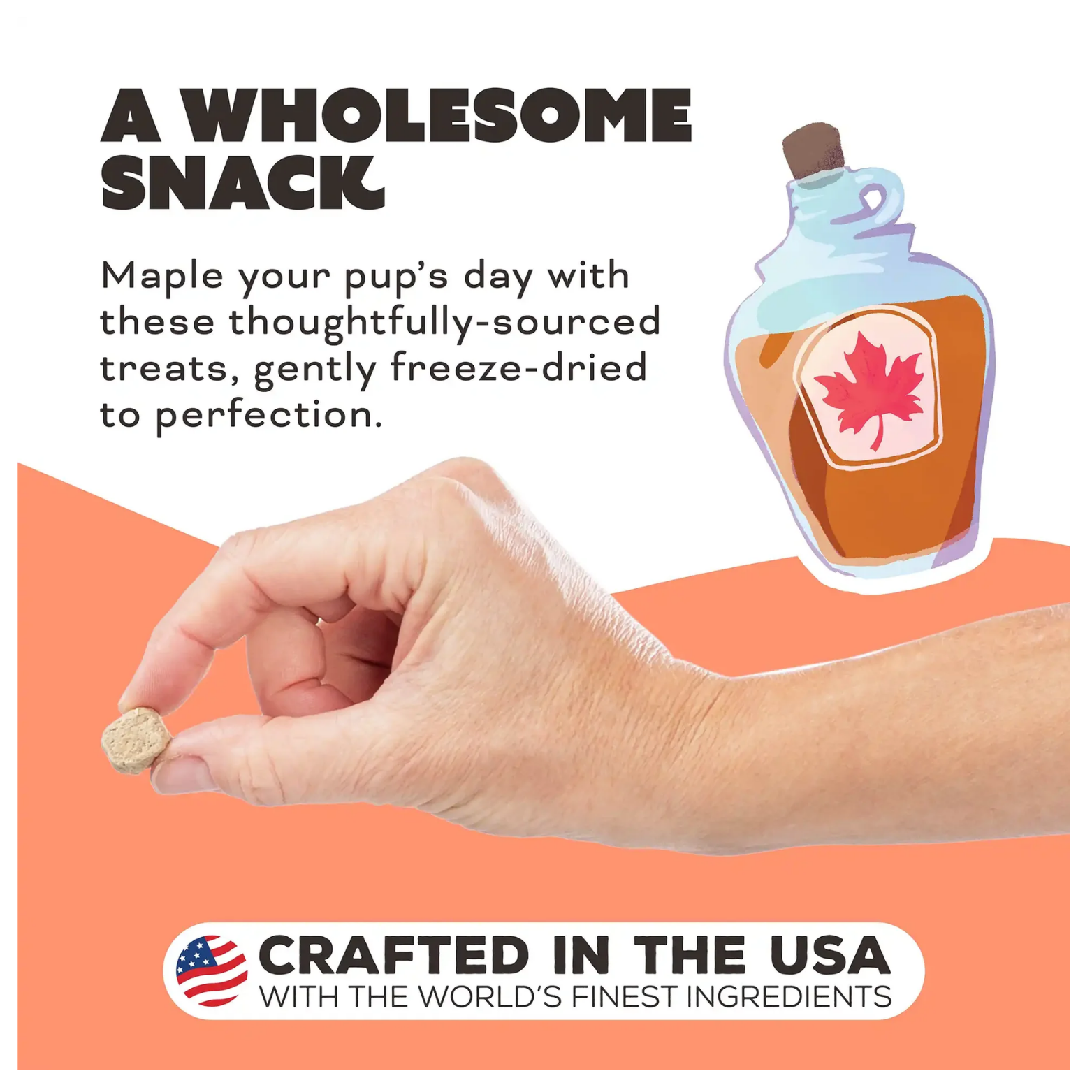 A lifestyle graphic showing a human hand holding one tiny cube-shaped treat to demonstrate its small size. Next to the hand is an illustration of a maple syrup bottle. At the bottom, a logo featuring the American flag states, "Crafted in the USA with the world's finest ingredients."