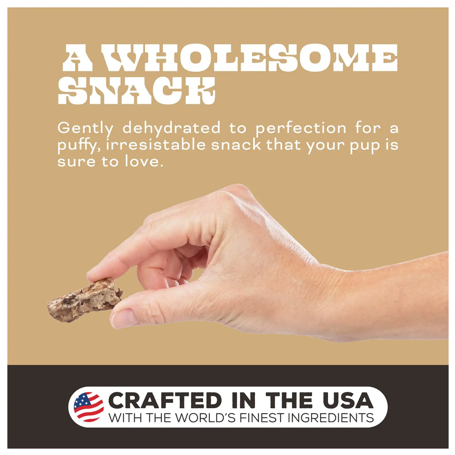 Hand holding a small piece of lamb lung treat against a tan background with text reading “A Wholesome Snack” and a description stating the treats are gently dehydrated for a puffy, irresistible texture. A banner at the bottom reads “Crafted in the USA with the world’s finest ingredients.”