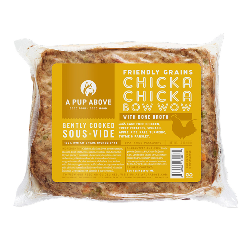 Vacuum-sealed package of A Pup Above Chicka Chicka Bow Wow dog food, with a yellow label showing it is a gently cooked sous-vide recipe made with cage-free chicken, bone broth, and friendly grains.
