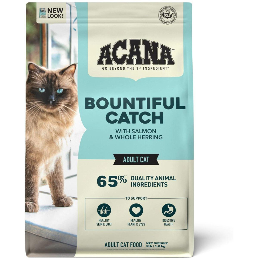 Front of the ACANA Bountiful Catch dry cat food bag featuring a long-haired cat, the product name “Bountiful Catch with salmon & whole herring,” “65% quality animal ingredients,” and icons for skin and coat health, heart and eye health, and digestive health.